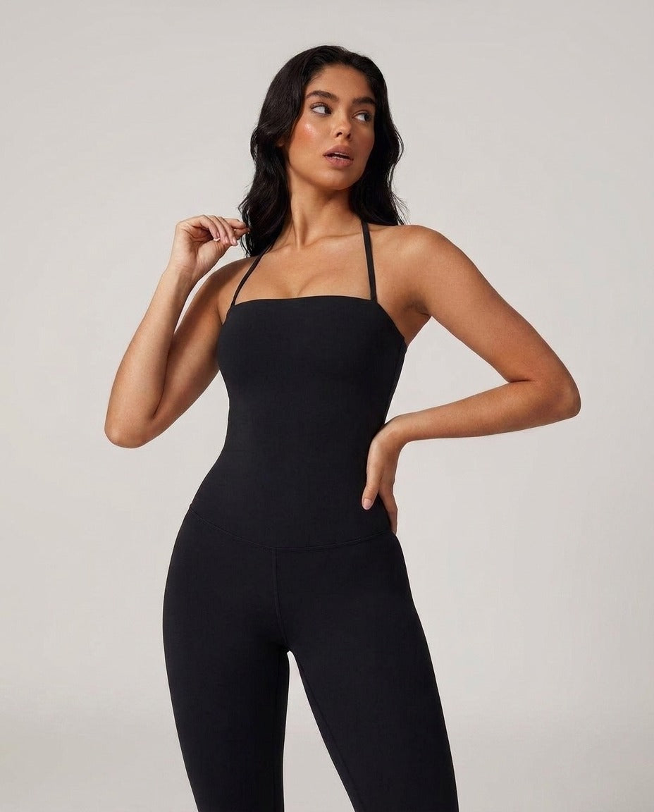 Volsa Flare Jumpsuit in black, worn, close