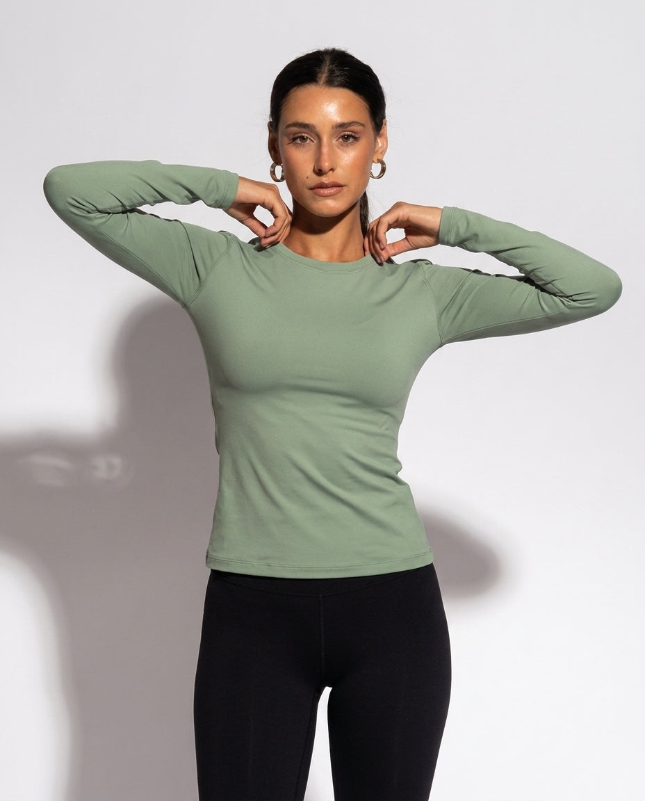 Volsa Long Sleeve Tee in sage, worn, detail
