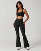 Volsa Ribbed Flare Leggings in black, worn, front