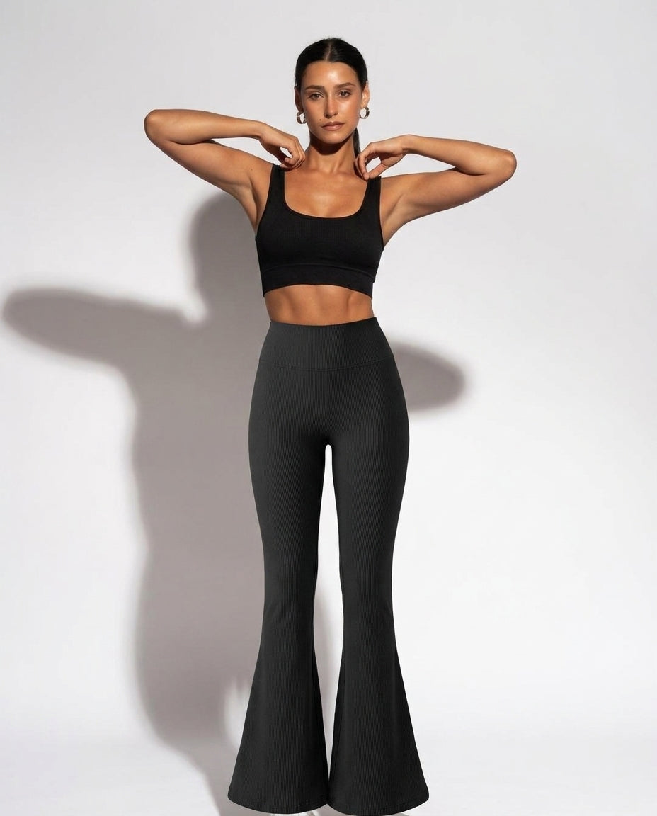 Volsa Ribbed Flare Leggings in black, worn, detail