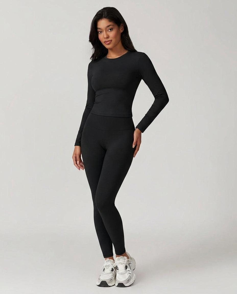 Volsa Long Sleeve Tee and Leggings Set in black, worn, front