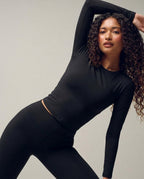 Volsa Long Sleeve Tee and Leggings Set in black, worn, side
