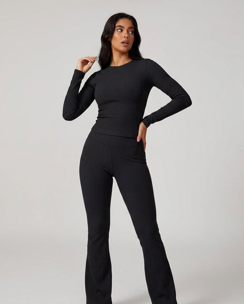 Volsa Ribbed Tee and Flare Leggings Set in black, worn, close
