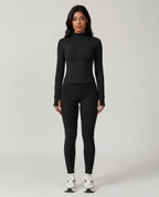 Volsa Zip Jacket and Leggings Set in black, worn, front