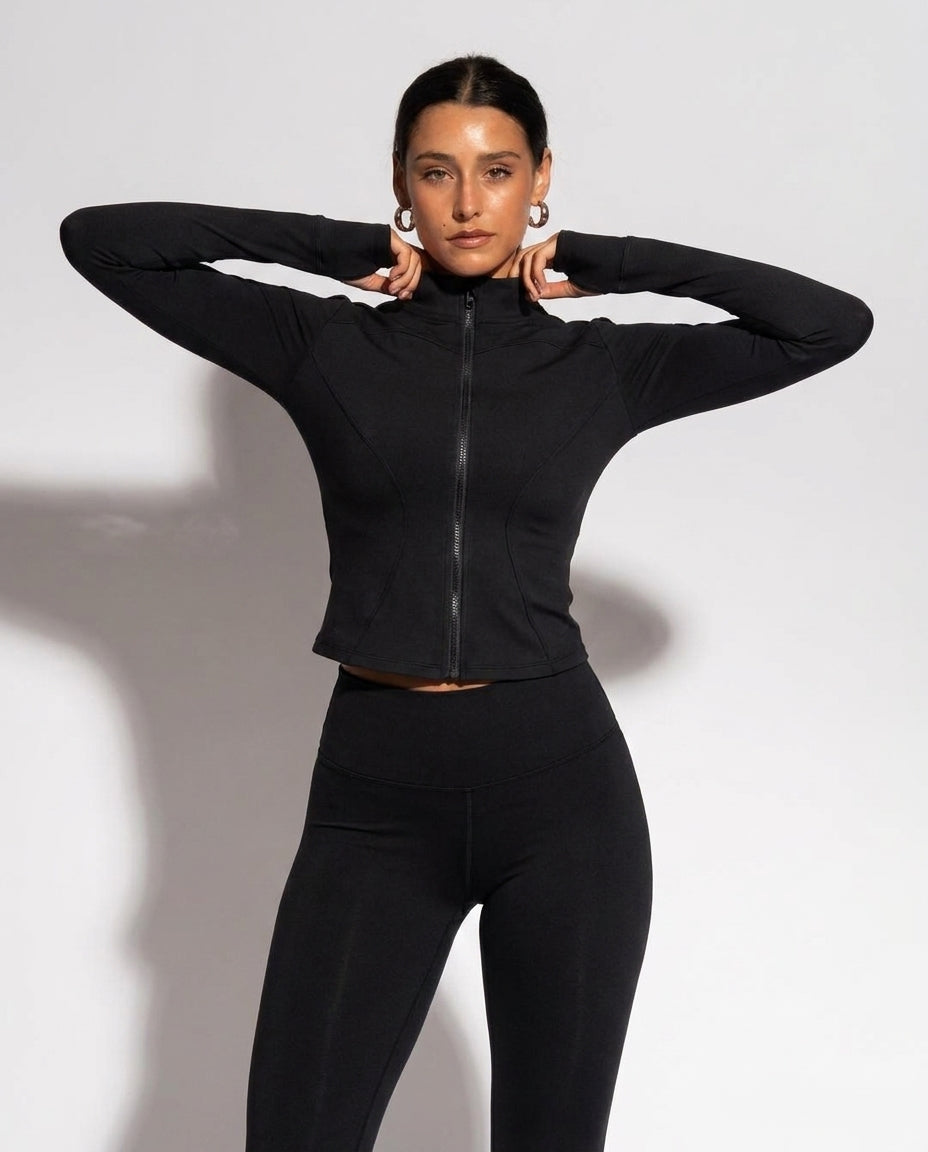 Volsa Zip Jacket and Leggings Set in black, worn, detail