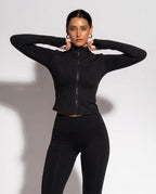 Volsa Zip Jacket and Leggings Set in black, worn, detail