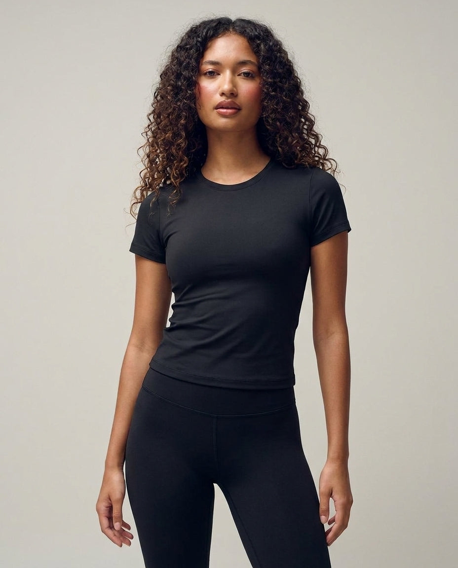Volsa Short Sleeve Tee in black, worn, side